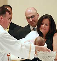 Trinitarian performing Baptism